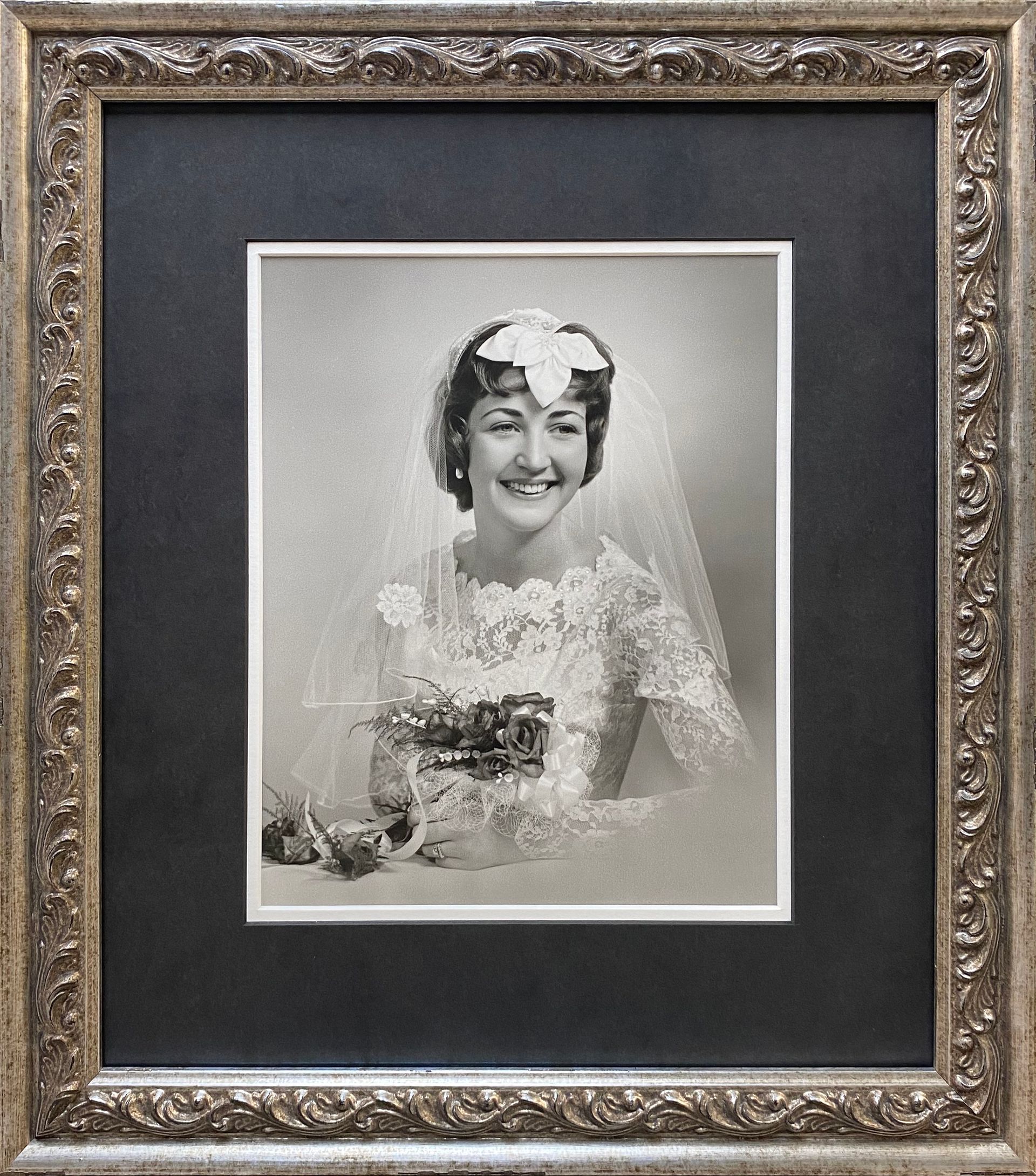 a black and white wedding photo of a bride