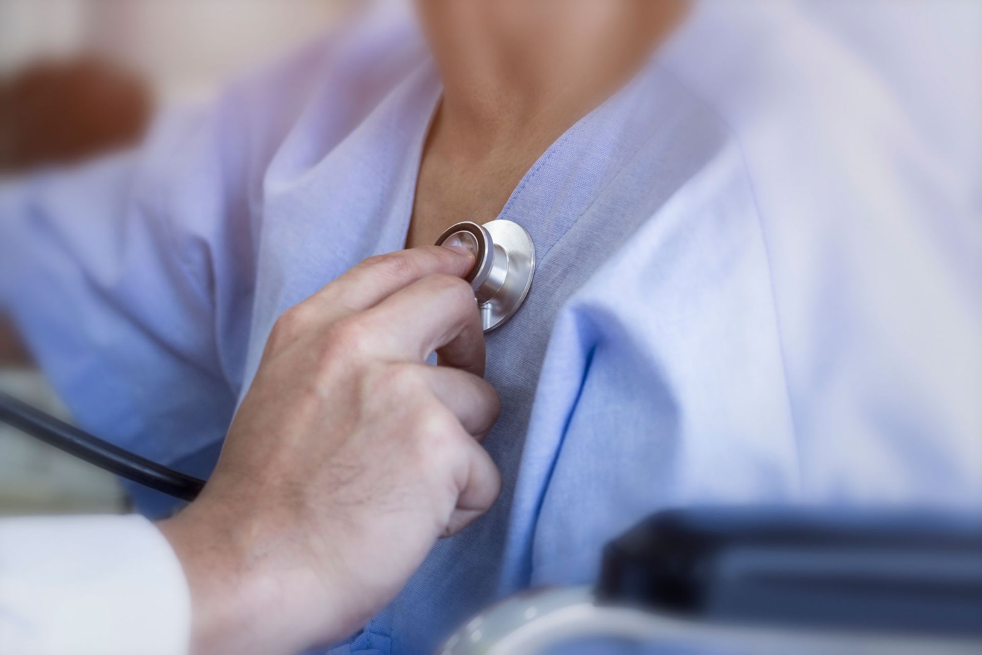 Checking Patient's Heart | Chicago, IL | Francisco L. Chuy, MD