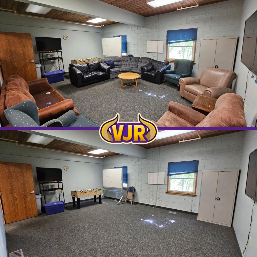 A living room with a vjr logo on the ceiling