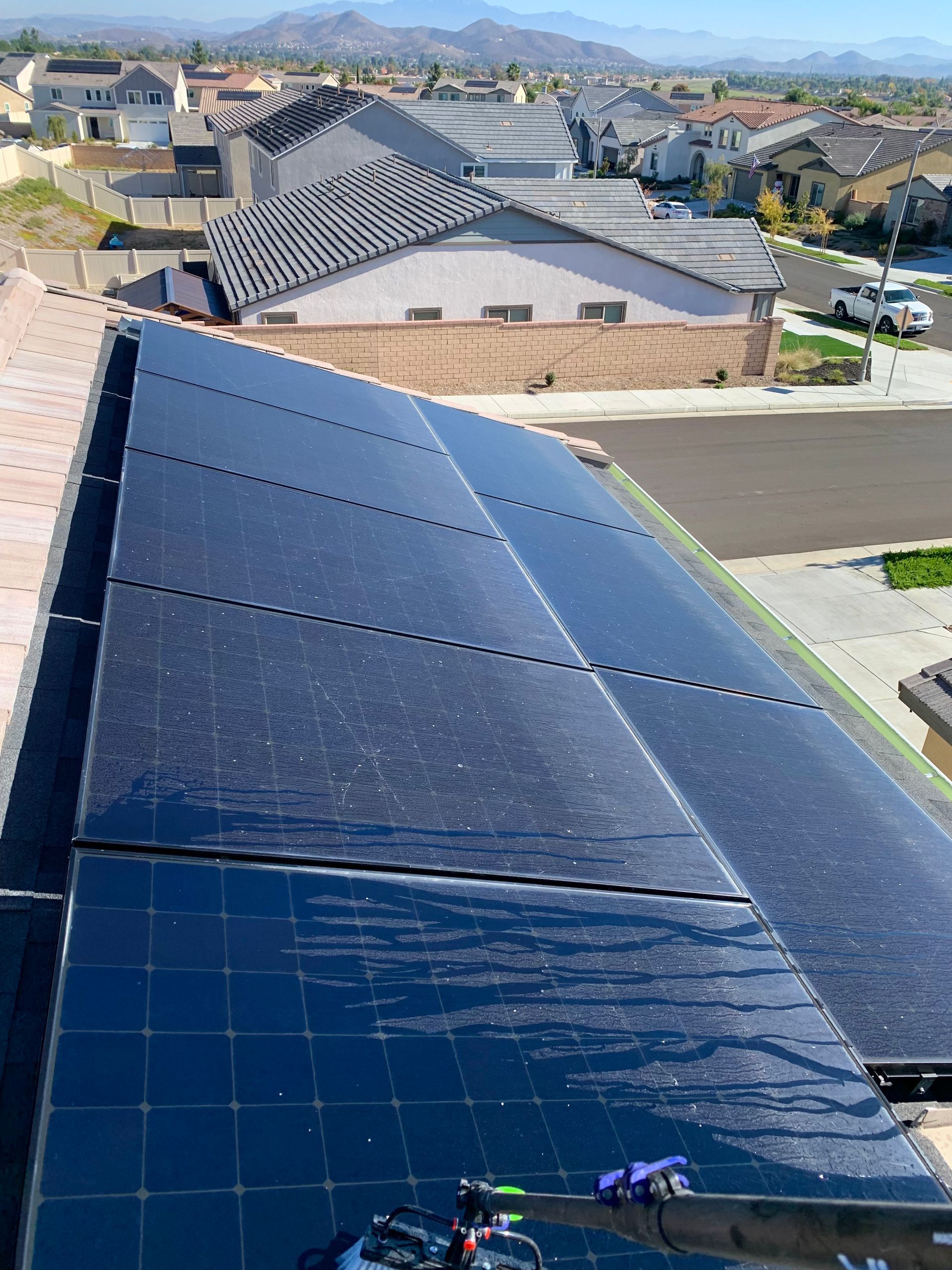 A roof with a lot of solar panels on it
