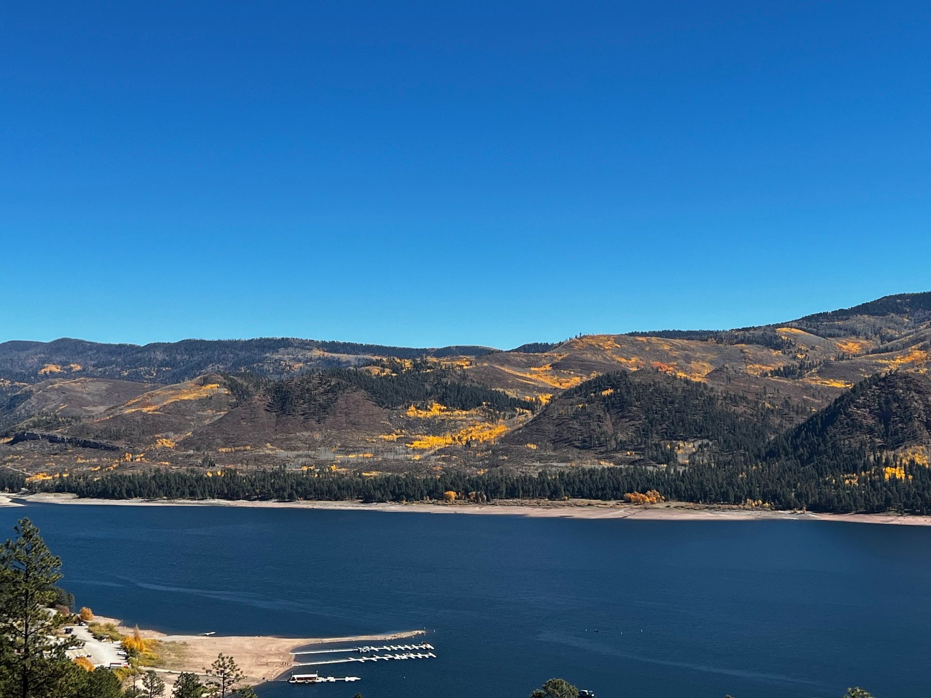 a view of a mountain and a lake