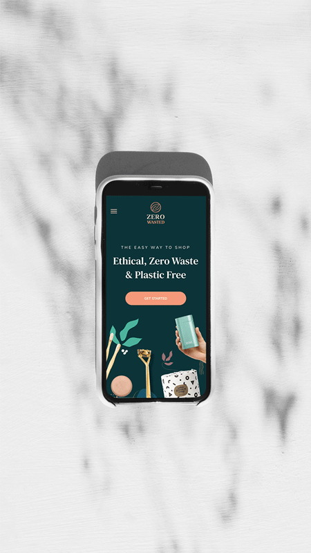 Smartphone displaying Zero Wasted website with Eco-Friendly, Zero Waste & Plastic Free