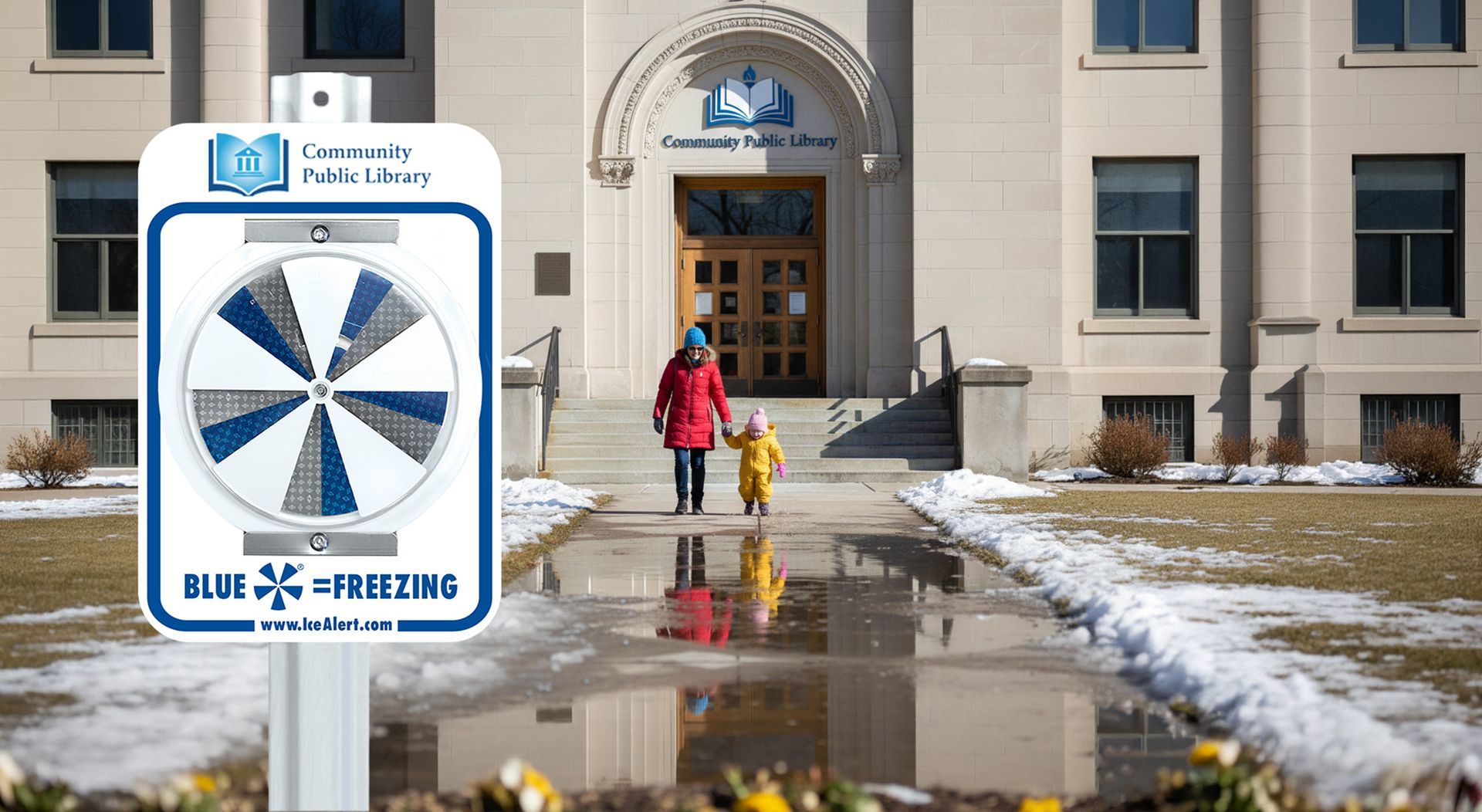 IceAlert sign for Community Public Library, and a child and adult walk toward entrance.