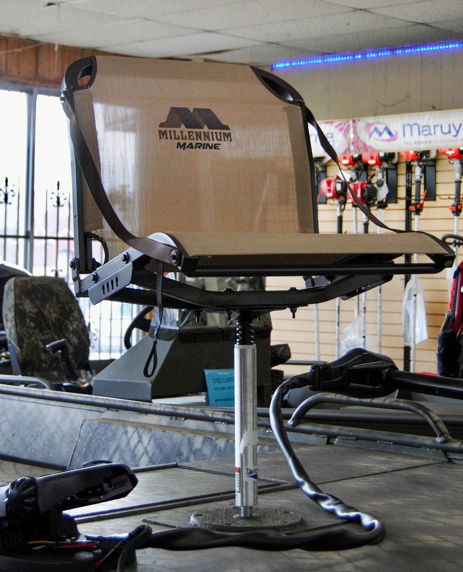 A chair that says millennium marine on it