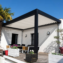 A patio with a pergola and a table and chairs A patio with a pergola and a table and chairs