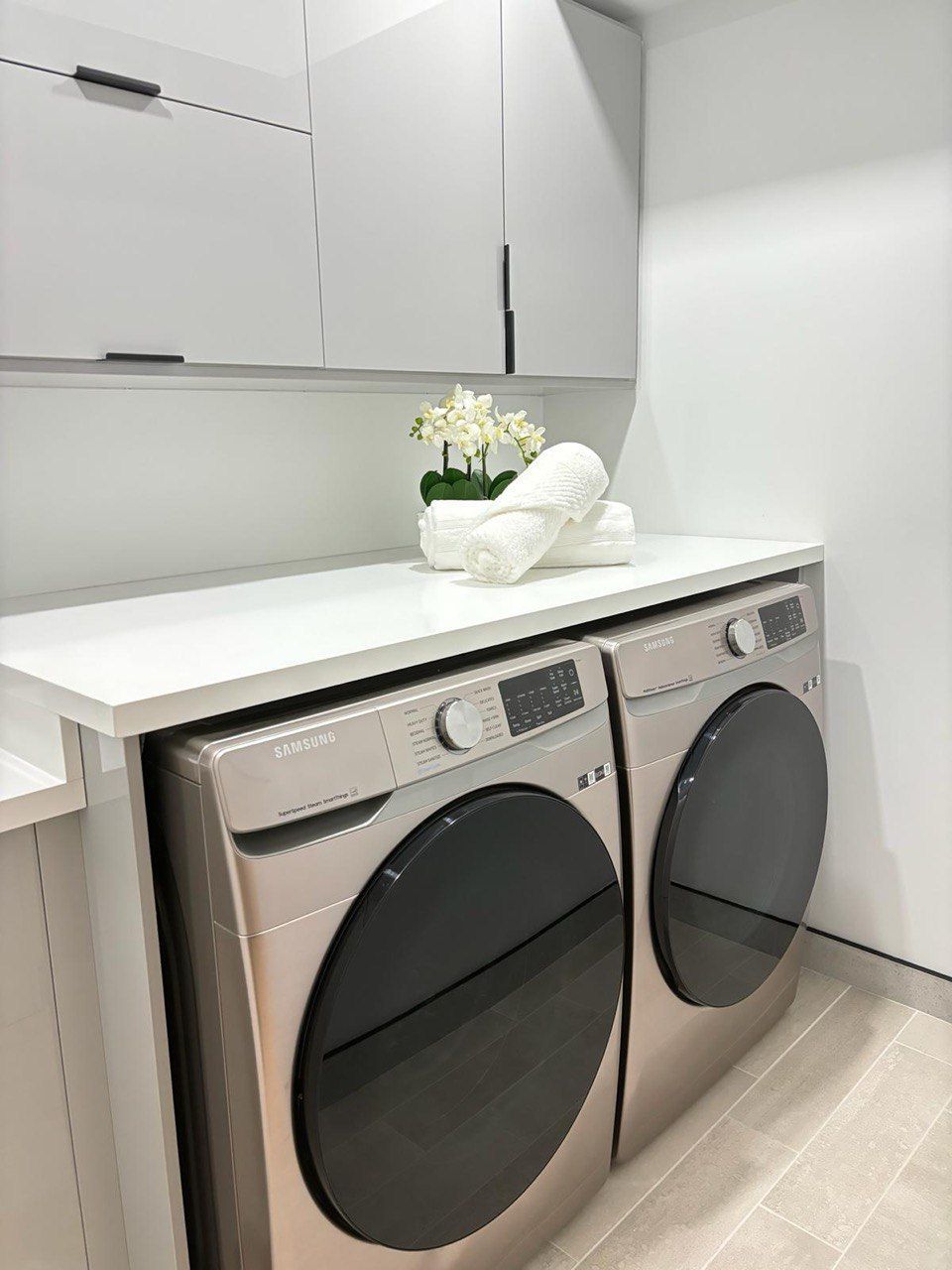 There is a washer and dryer in the laundry room.