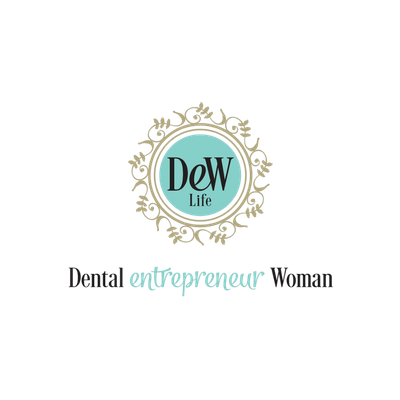 A decorative circular logo with light teal and gold accents, featuring the text
