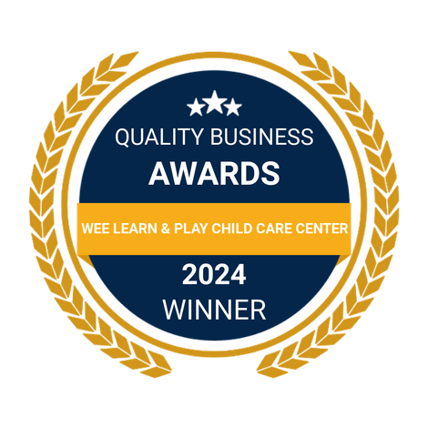 Gold laurel award badge reading “Quality Business Awards” and “2024 Winner” for Wee Learn & Play Child Care Center