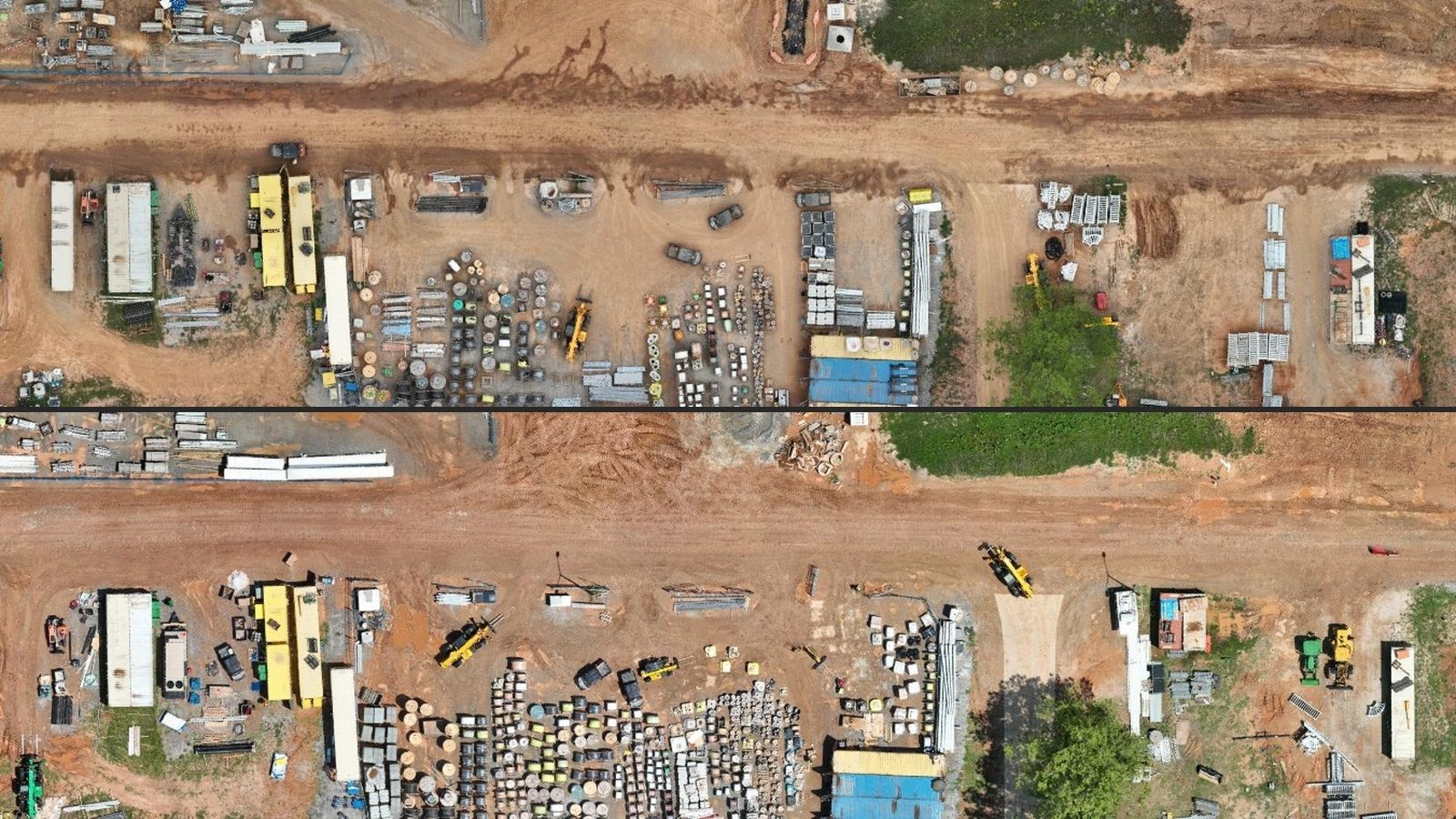 Aerial view of a dusty industrial yard with rows of parked vehicles, scrap, and machinery.