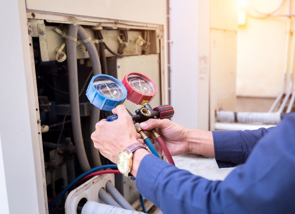Technician is Checking Air Conditioner — Westfield, IN — Shift Heating & Air