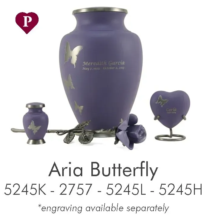 A purple vase with a butterfly on it