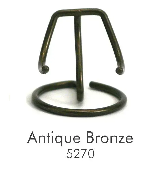 A picture of an antique bronze item with a white background