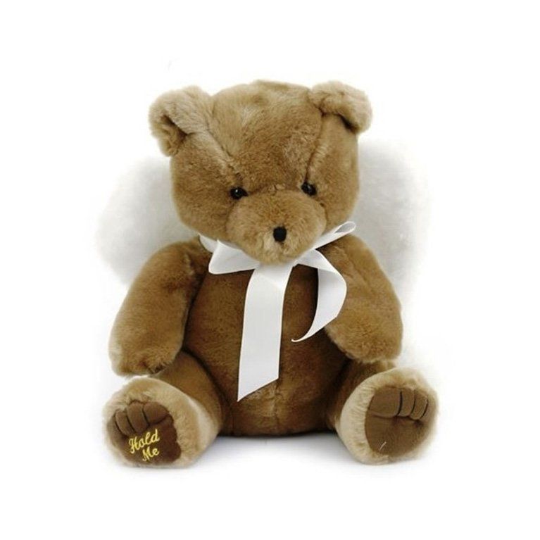 A brown teddy bear with a white bow around its neck