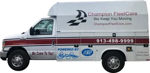 White Champion FleetCare service van with logos and phone number 913-498-9999 on the side.