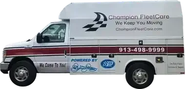 White Champion FleetCare service van with red stripe, logo, and phone number 913-498-9999