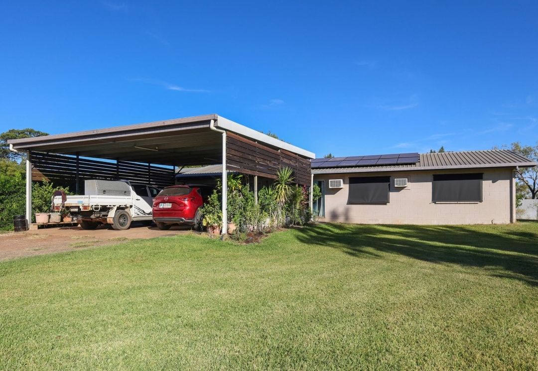 A Car is Parked Under a Canopy in Front of a House — Outback Auctions and Real Estate in Normanton, QLD