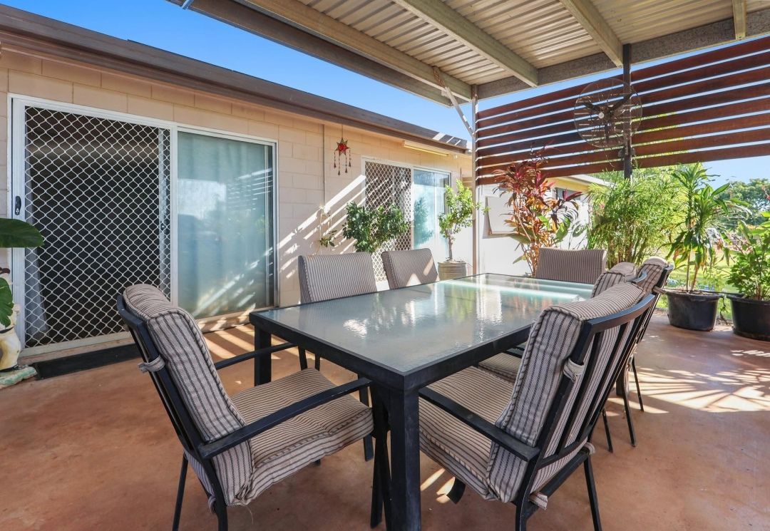 A Patio With a Table and Chairs Under a Canopy — Outback Auctions and Real Estate in Karumba, QLD