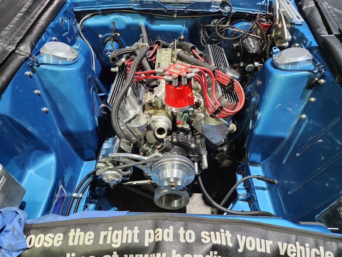Blue Car Engine Bay With Engine Installed by a Mechanic — Total Auto Service In Caloundra West, QLD