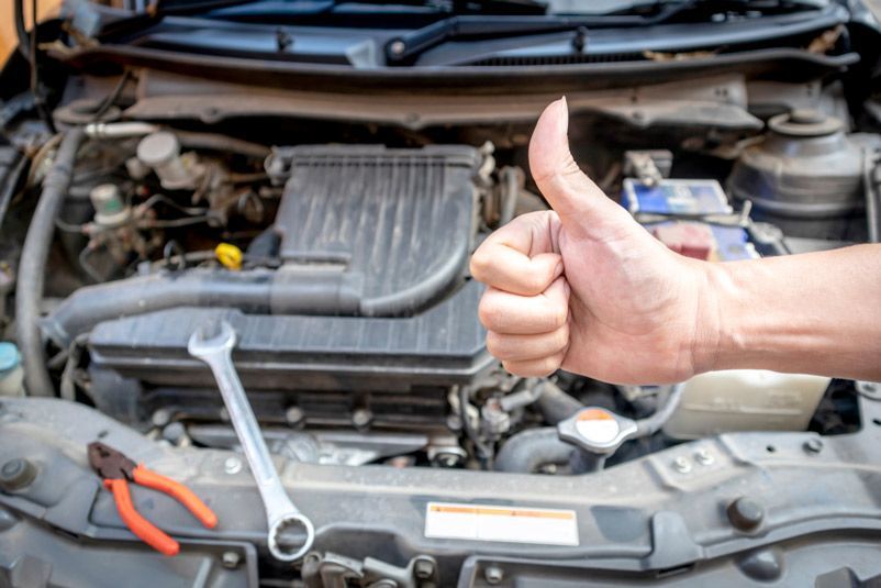 Automotive Mechanic Show a Thumbs Up — Total Auto Service In Caloundra West, QLD