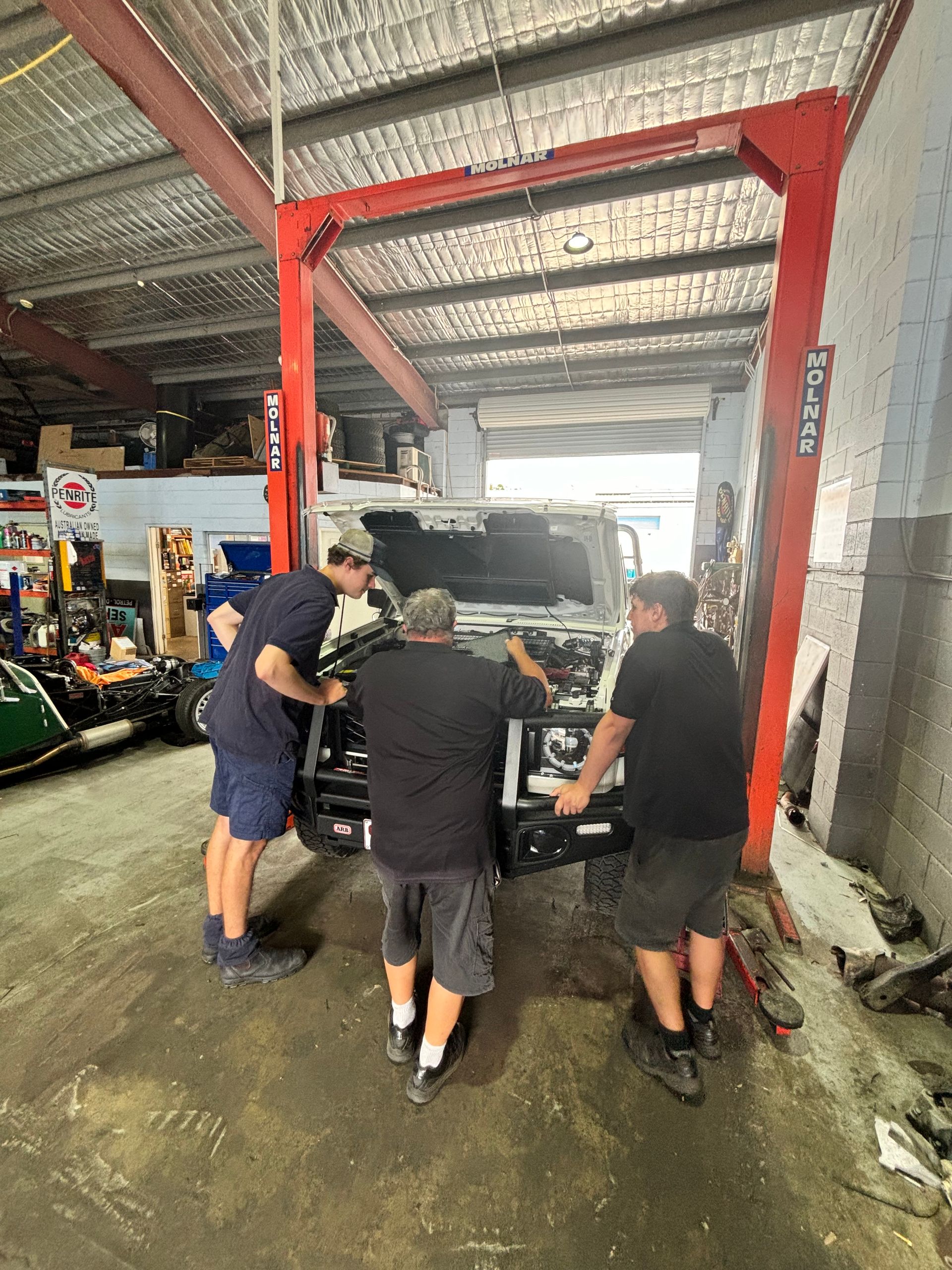 Mechanic in Uniform — Total Auto Service In Caloundra West, QLD