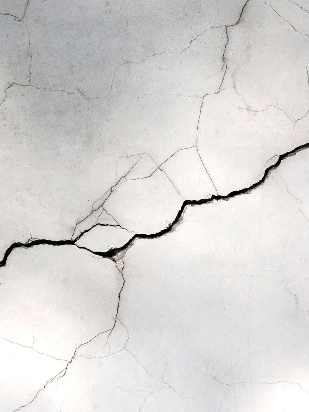 white wall with cracks