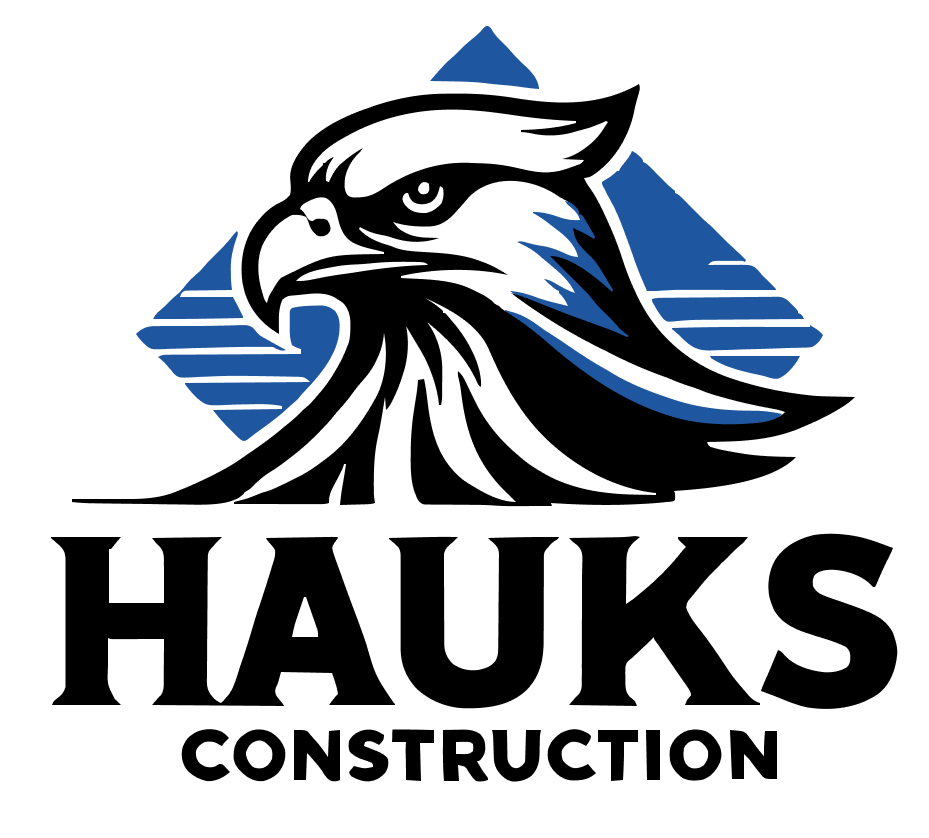 A black and white logo for Hawks Construction with an eagle 's head.