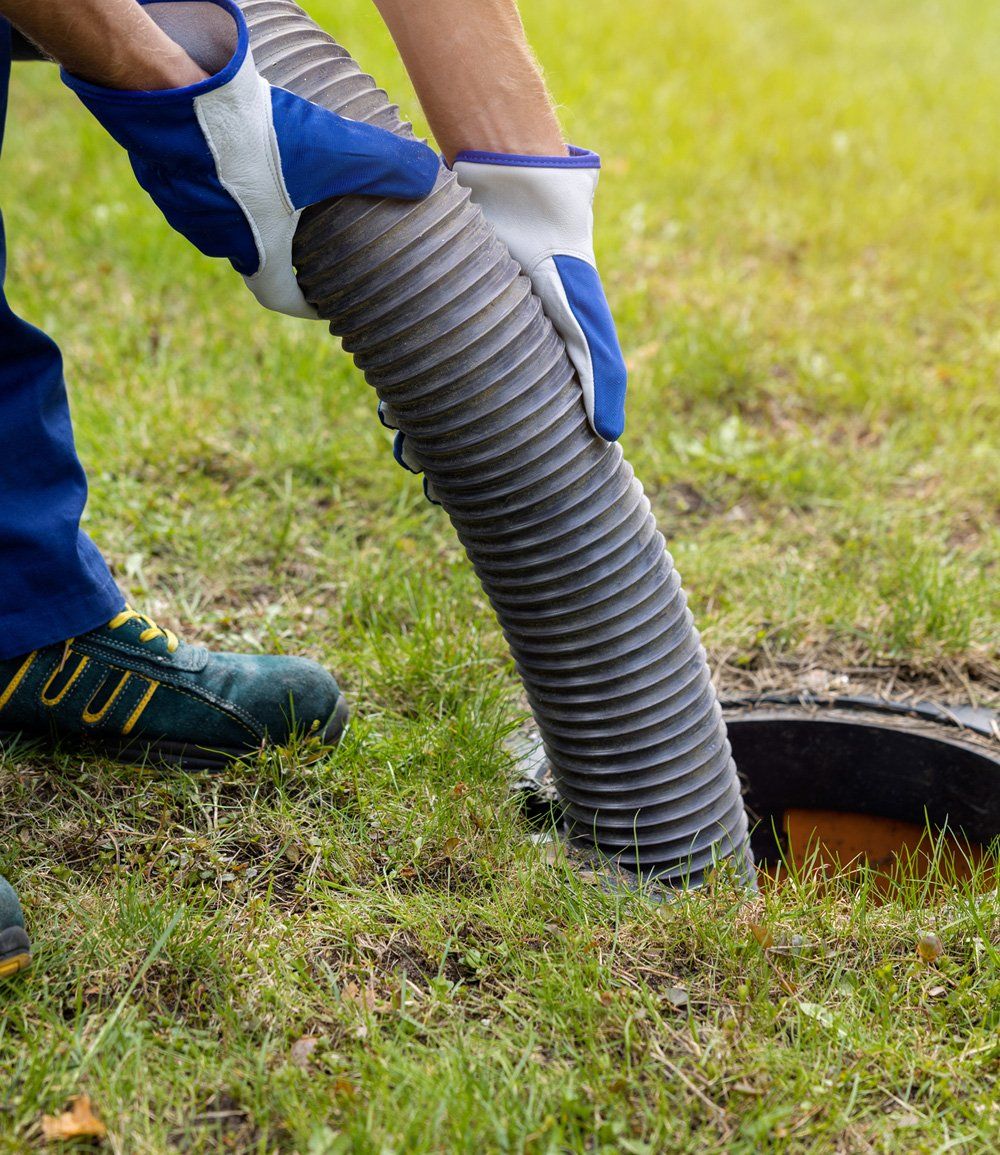 Hose Inside the Septic Tank — Sydney, NSW — 100% Liquid Waste Solutions Hose Inside the Septic Tank — Sydney, NSW — 100% Liquid Waste Solutions