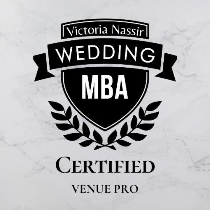 Black and white badge for Victoria Nassir, a