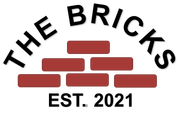 Logo featuring the text "THE BRICKS" arched over a pyramid of red bricks, with "EST. 2021" printed below on white background.