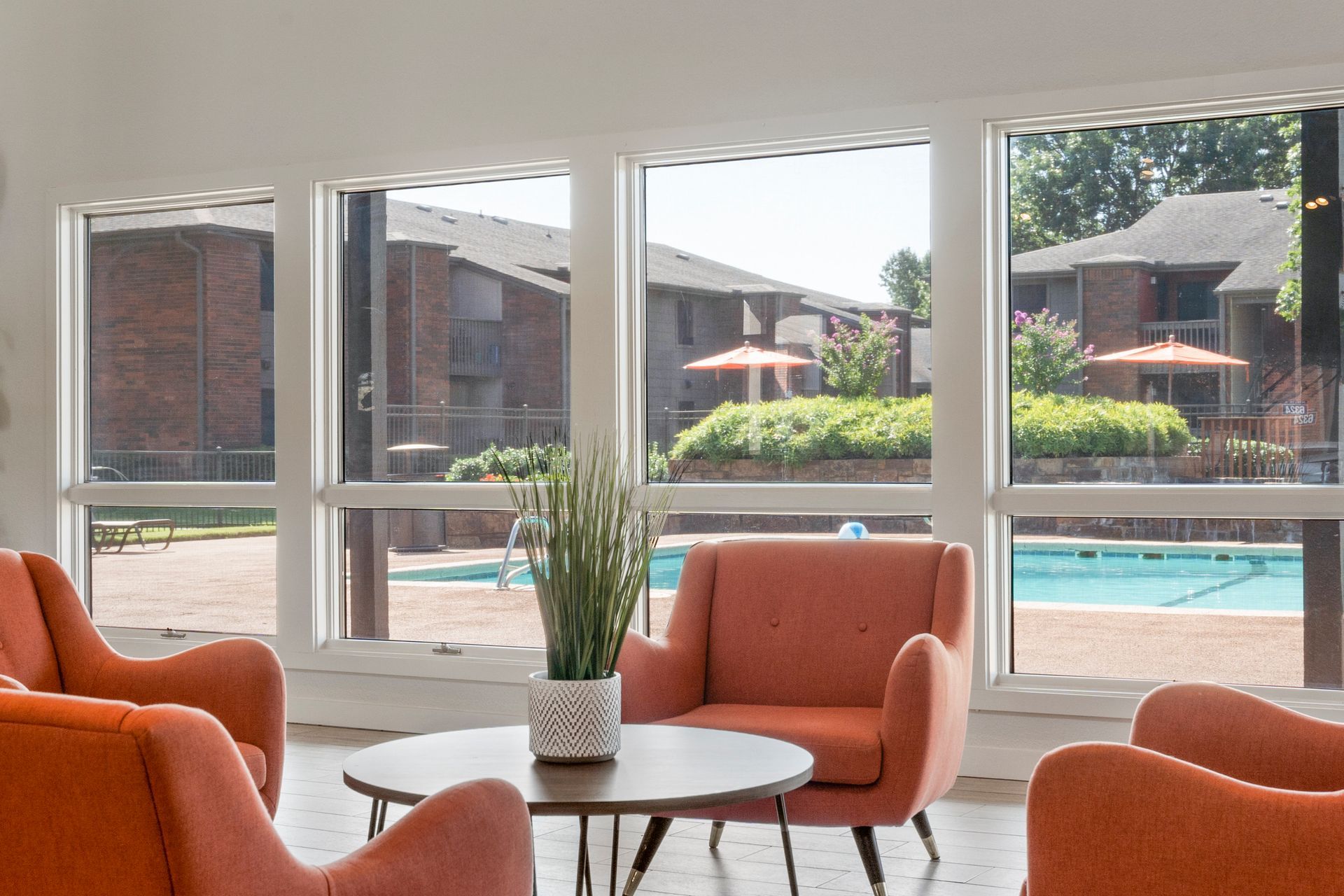 echo trail clubhouse lounge area with view of pool 2