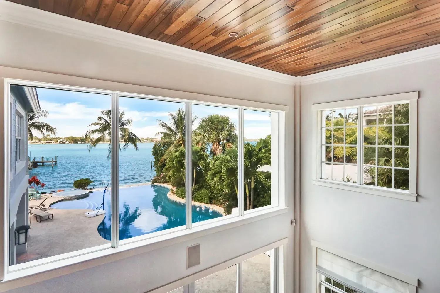 Beach house window view lkiving room Interior Design Lisa St. Amand Designs