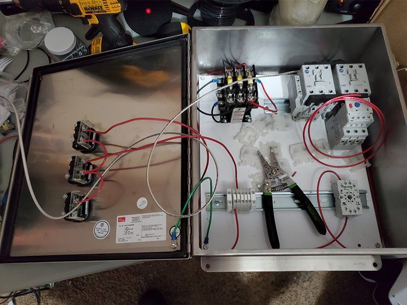 Wiring an electrical panel in St. Joseph, MO - TDR Electrical Services hard at work