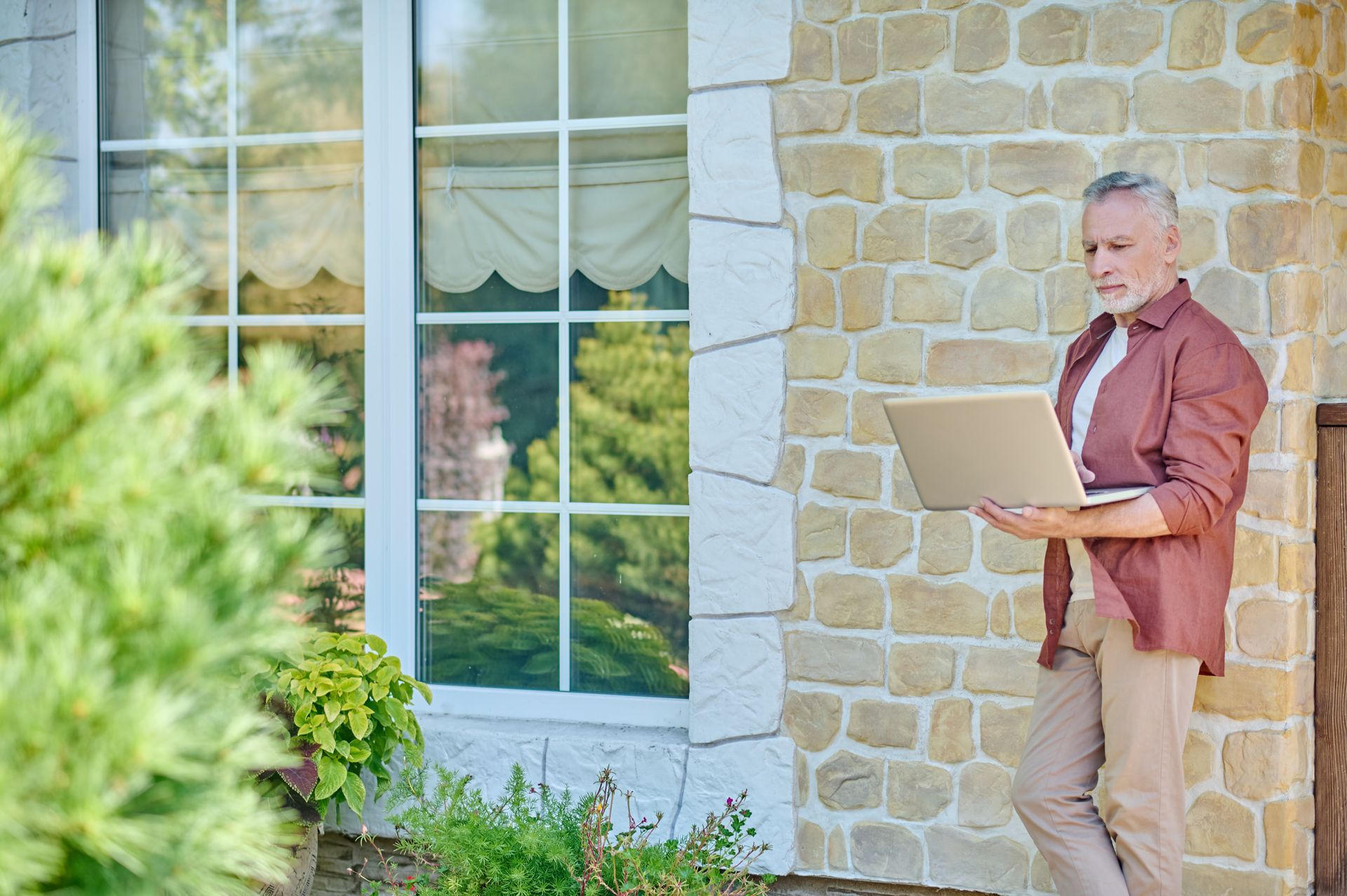 Certified appraiser evaluating updated kitchen during home appraisal.