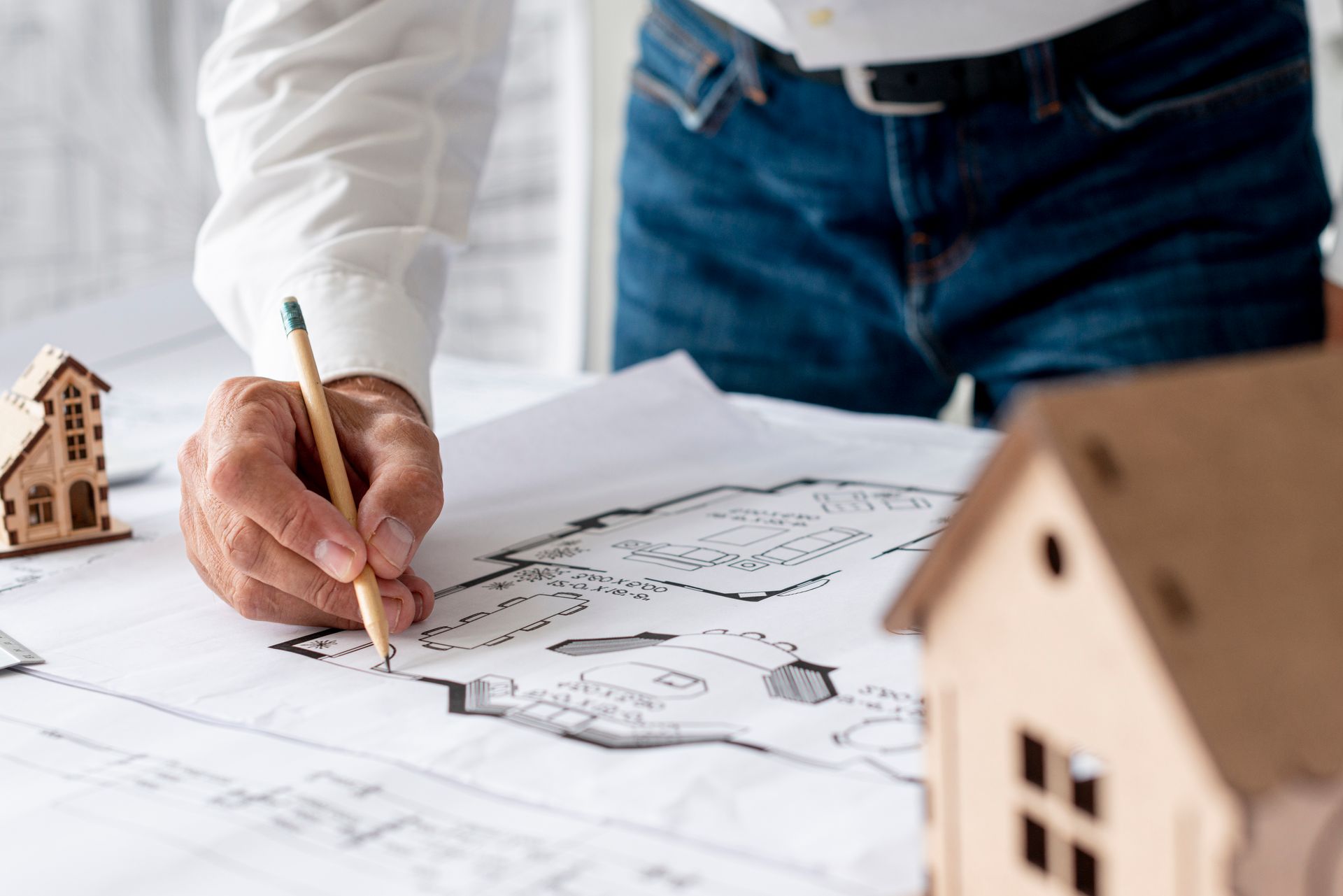 Residential appraiser measuring living area for accurate home value.