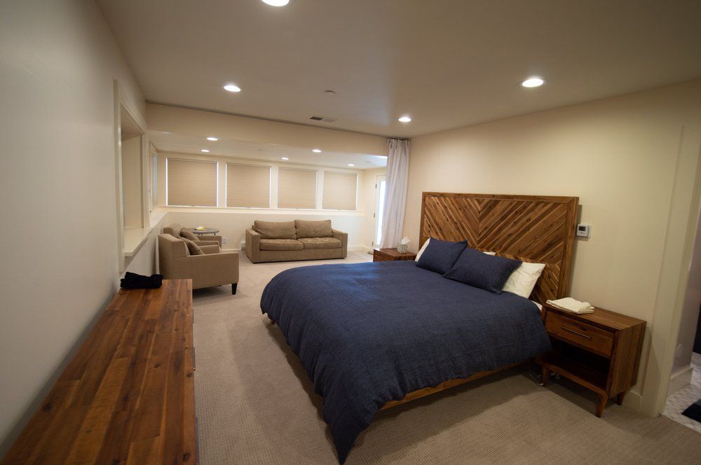 There is a large bed in the middle of the room.