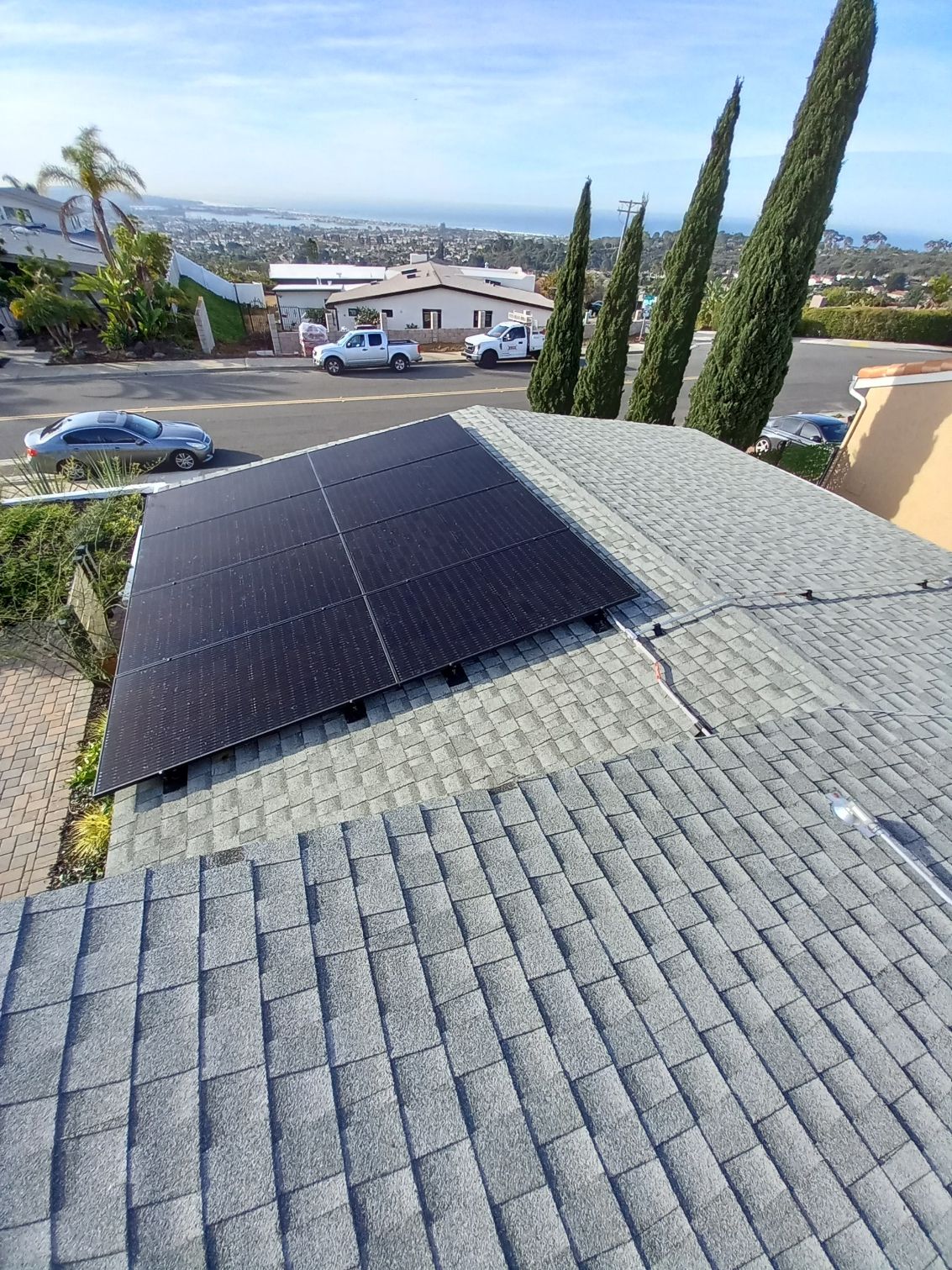 A roof with a lot of solar panels on it