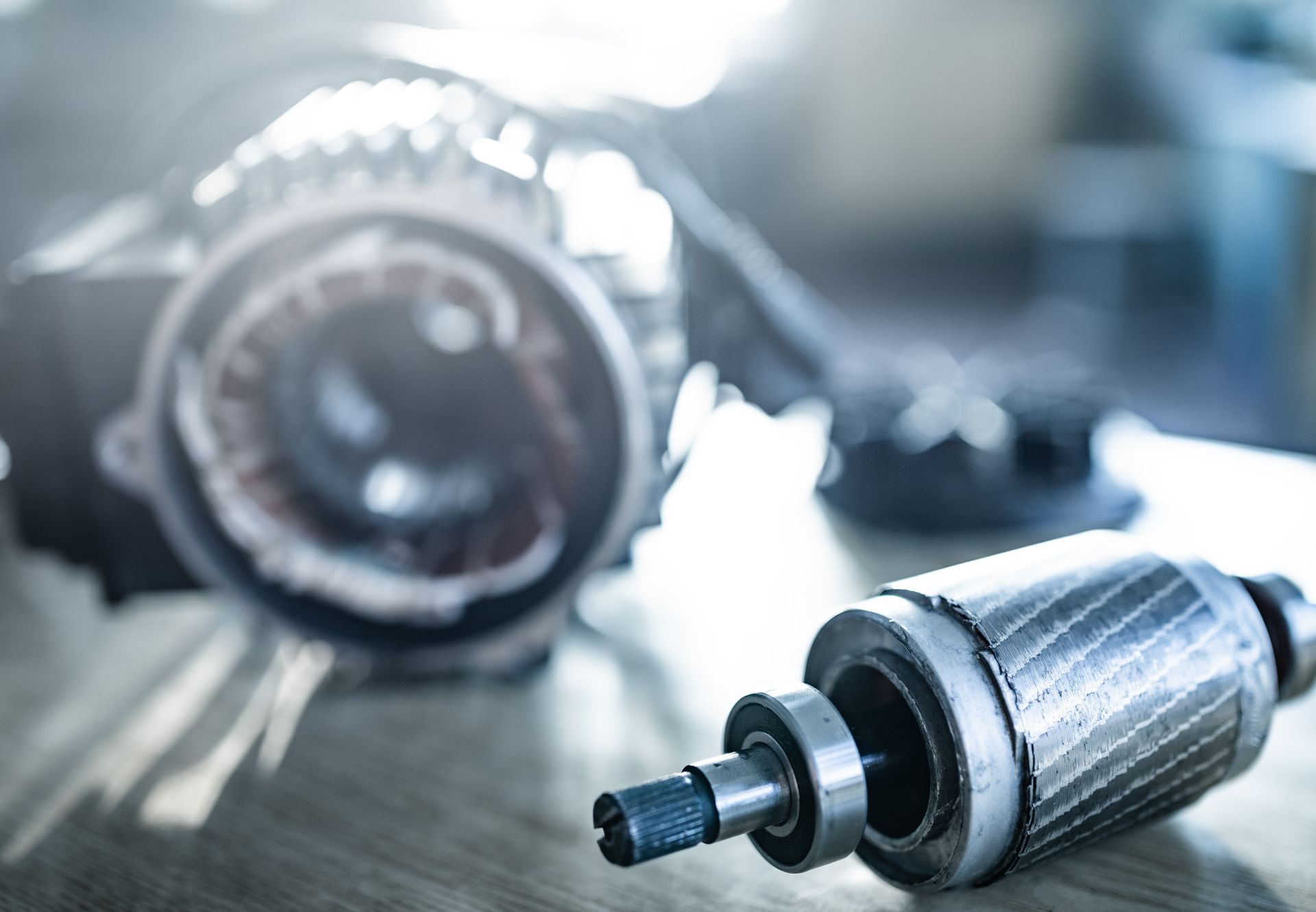 Close-up of iron industrial motor lies on a table. Close-up of iron industrial motor lies on a table.