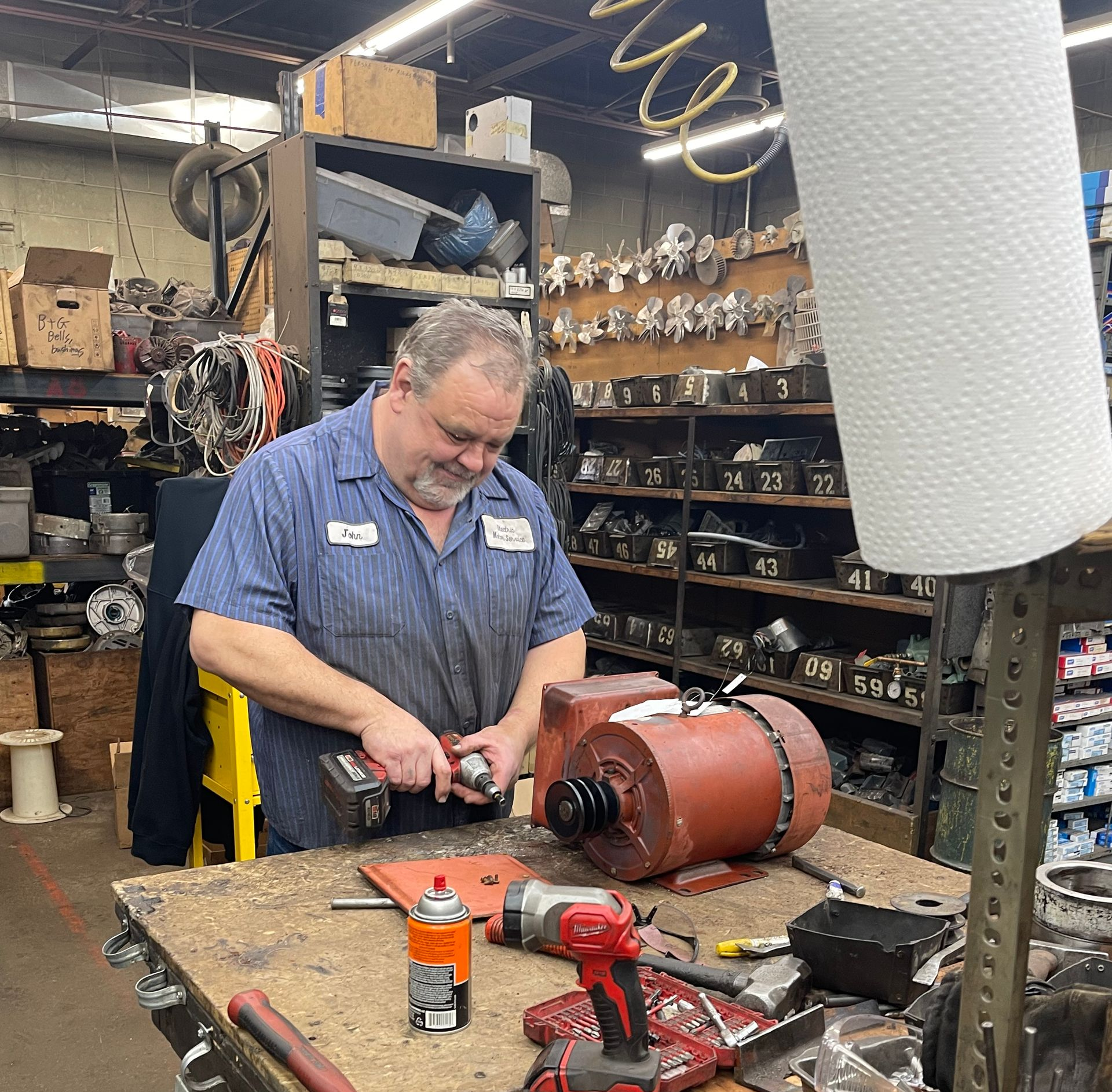 Technician repairing an electric motor at Electric Motor Service Inc. in St. Cloud, Minnesota