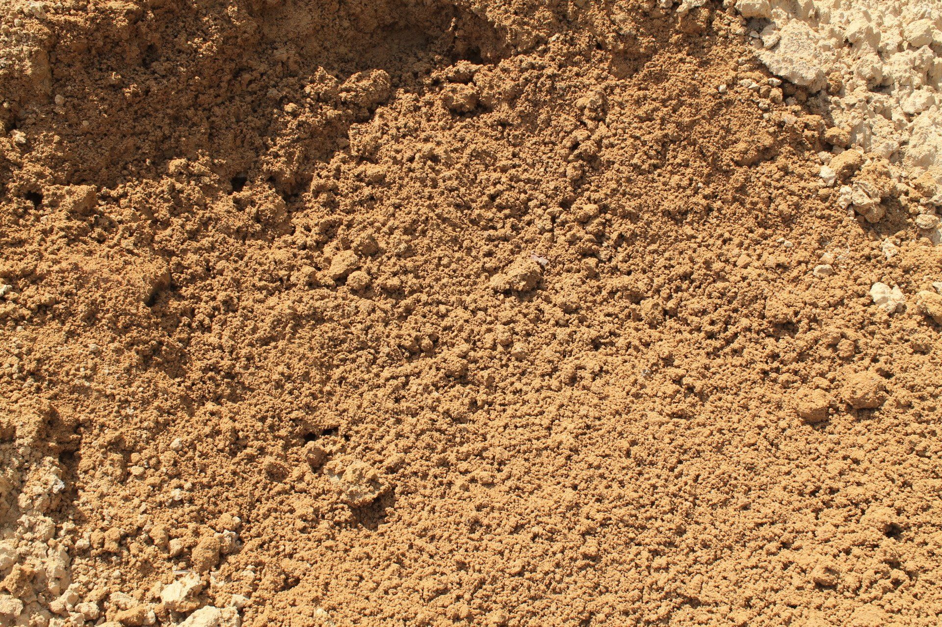 Pile of brown sand.