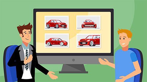 Two men beside a monitor showing four red car images on a green background