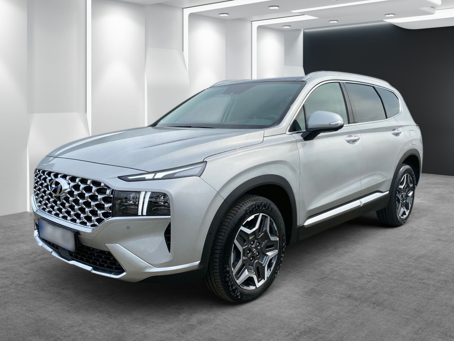 Silver SUV in a showroom, shown from the front-left angle