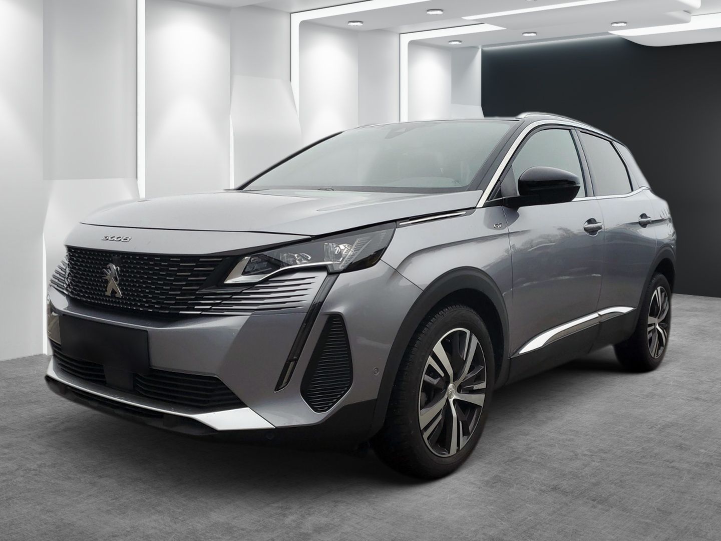 Silver Peugeot SUV in a bright studio, shown front-left with sleek headlights and black trim