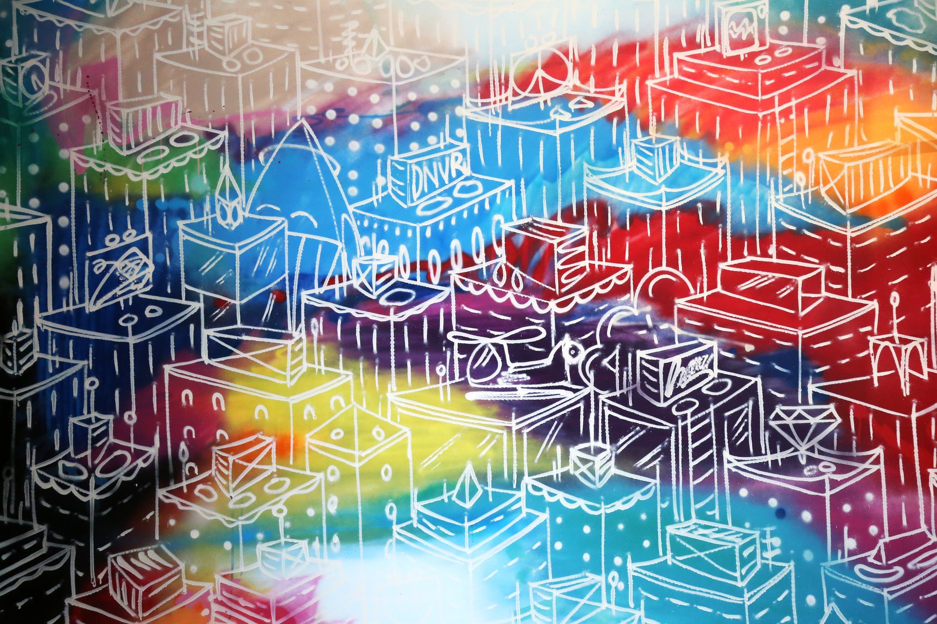 Colorful abstract cityscape sketch with neon blues, reds, yellows, and white line drawings