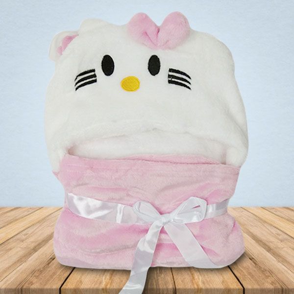 Een witte en roze Hello Kitty deken met een strik