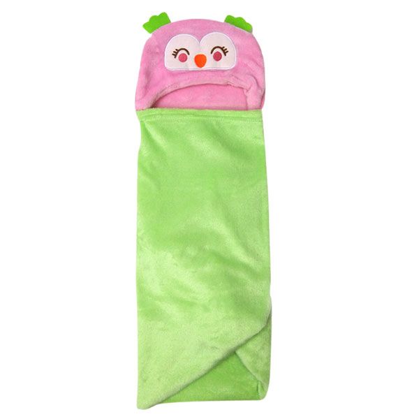 Een roze en groene deken met een uil erop