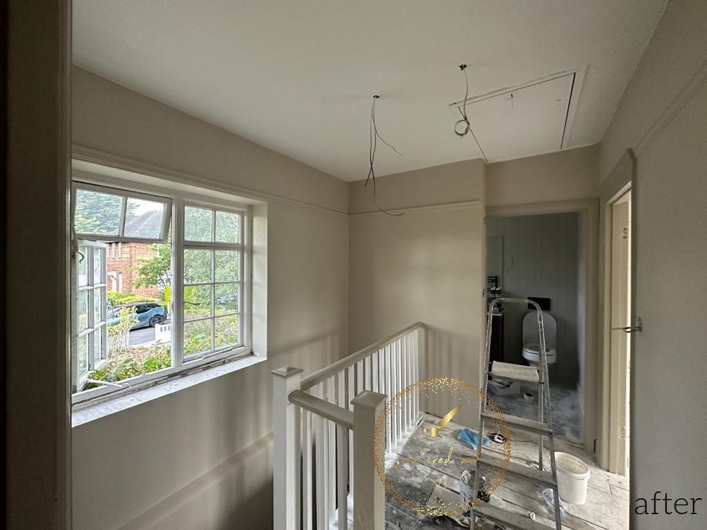 After picture of interior painting of a high staircase in North London