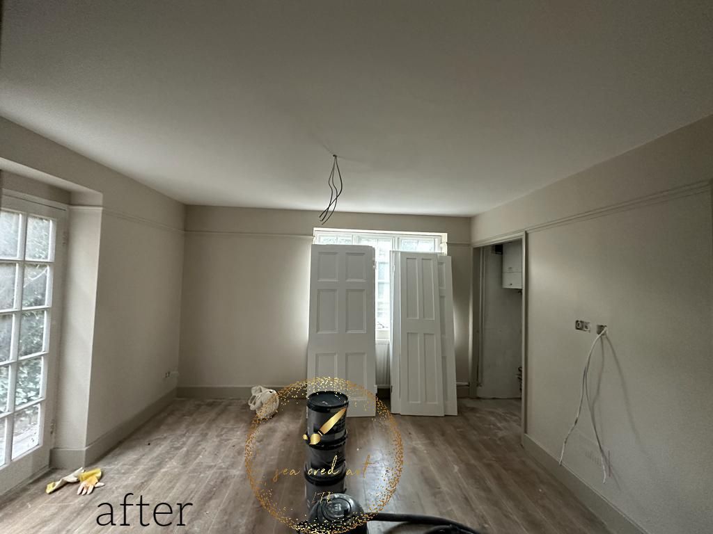 after removing wallaper , painting results of a living room in North London 