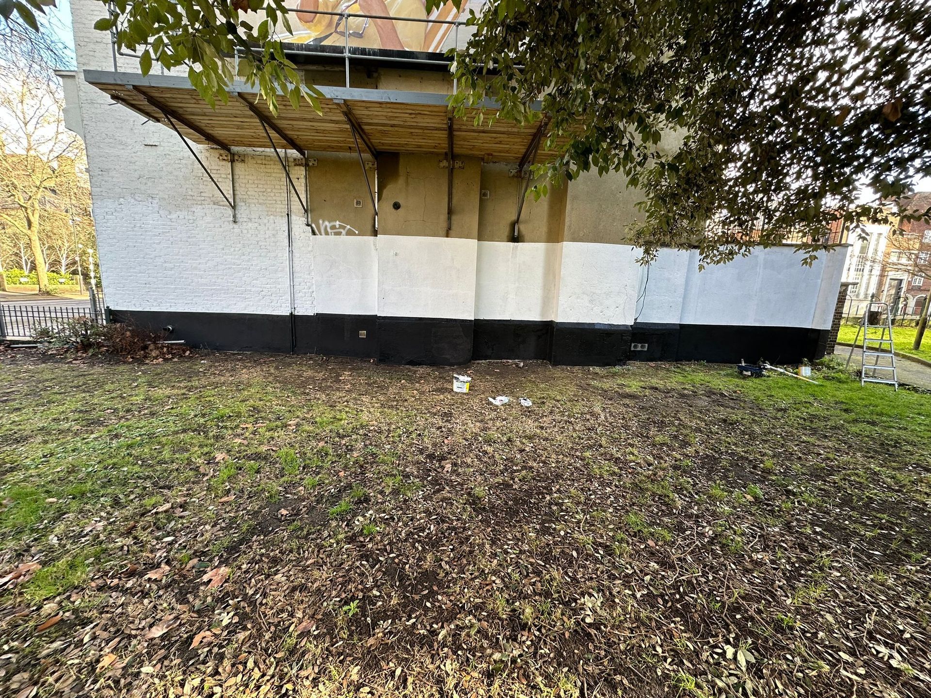 Exterior painting over graffiti after photo North London