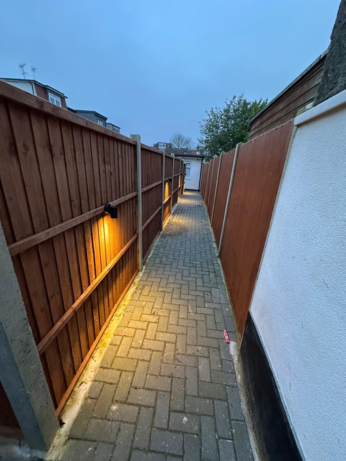 after picture of painting a fence in Golders Green