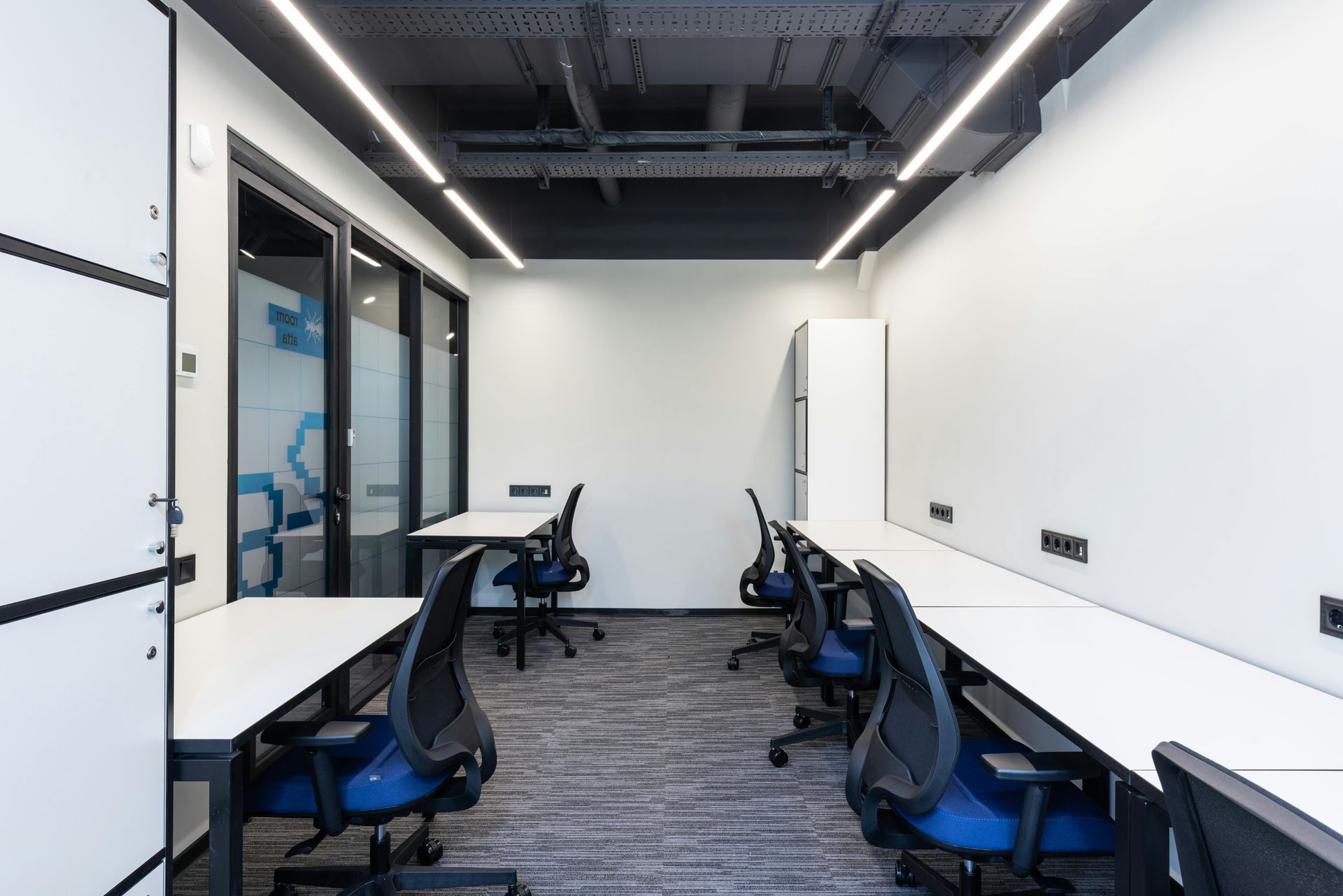 A Room With a Lot of Desks and Chairs in It — Dawsons Cleaning Specialist In Mount Louisa, QLD